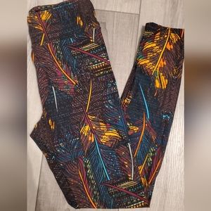Lularoe one size buttery soft leggings. Feather motif
